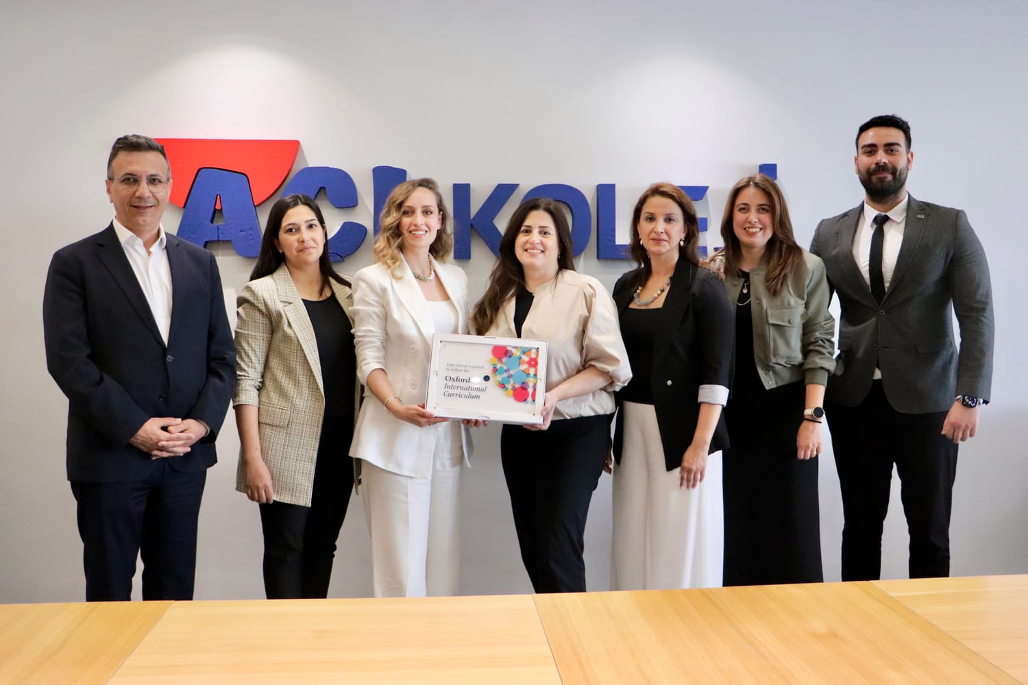 Açı College team with the Oxford International Curriculum education set