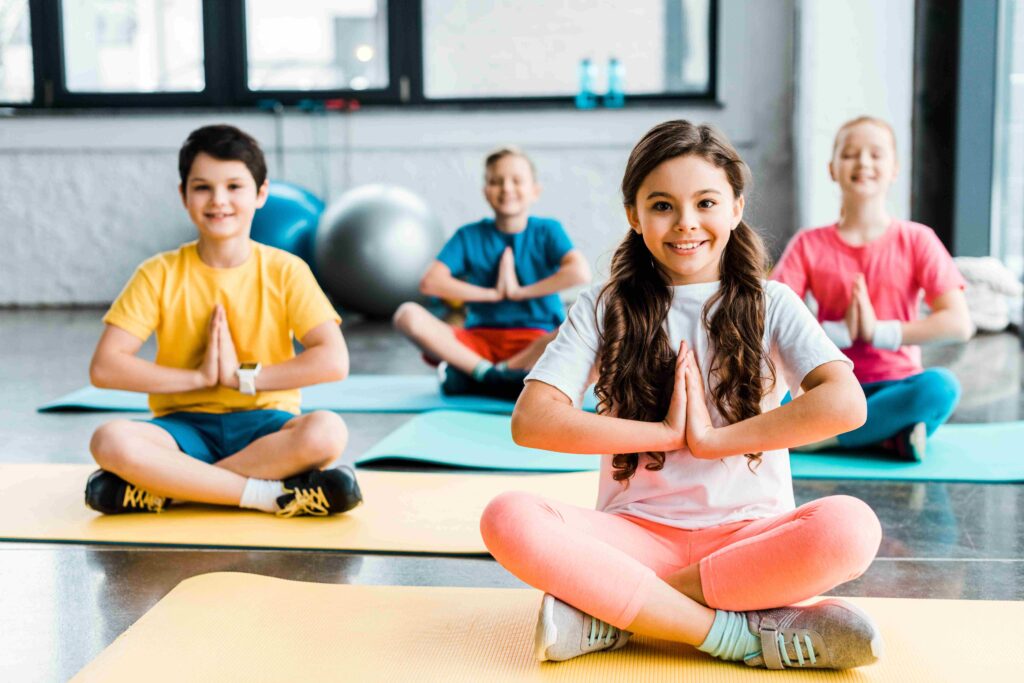 Children stretching during a movement activity