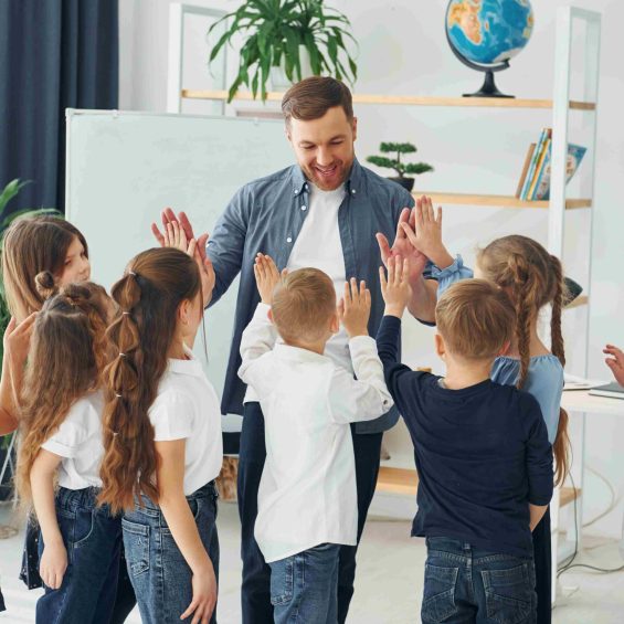 Children giving high fives