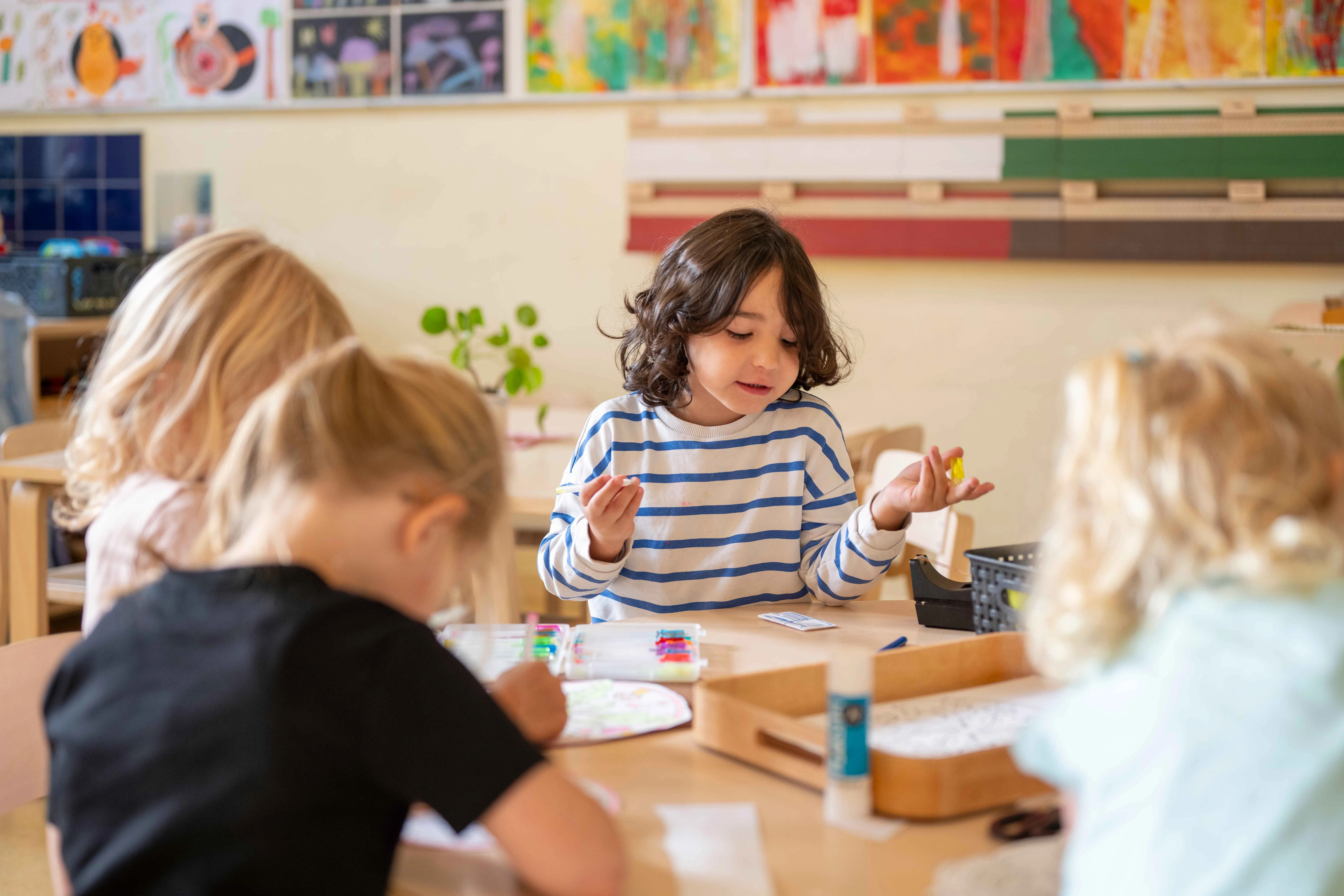 Kindergarten students focused on their lessons